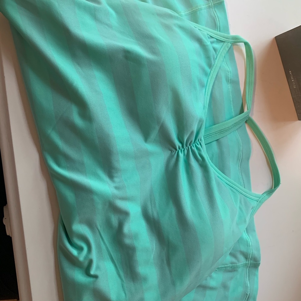 Green and grey Nike tank top with built in pads